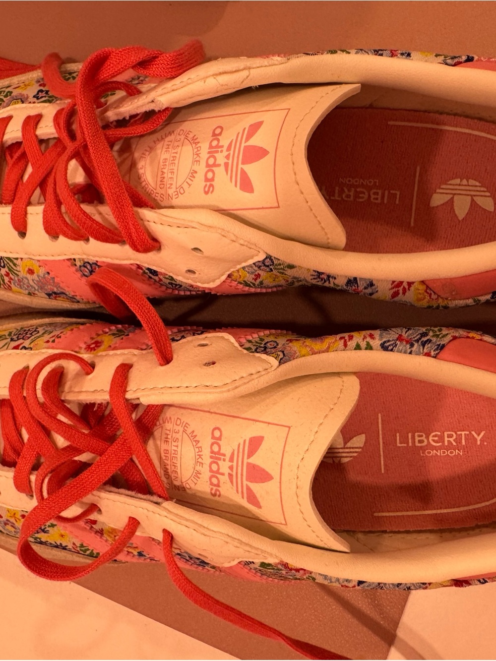 adidas Kids/Womens White Sneakers with Red Laces and Multicolor Floral Print